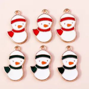 Detailed view of colorful Christmas snowman enamel pendants for DIY jewelry making