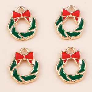 Set of Christmas wreath charms in gold alloy with red bow and green enamel for DIY jewelry