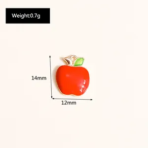 Detail of a red apple pendant with size 14mm by 12mm and weight 0.7g for DIY jewelry