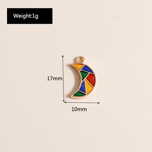 Macro view showing 17mm x 10mm colorful enamel crescent moon pendant dimensions and weight