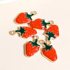 Set of red strawberry alloy pendants with gold leaf hooks for DIY jewelry making