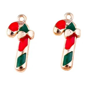 Christmas candy cane pendants in red and green enamel with golden bow accents