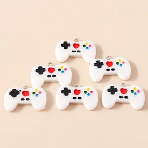 Set of 6 white acrylic resin game controller charms with colorful buttons and metal hooks