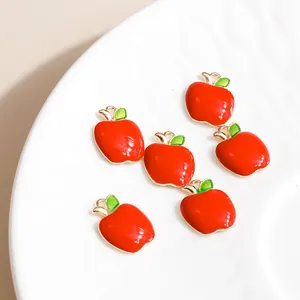 Set of red apple alloy pendants with green leaf for DIY jewelry making and crafts