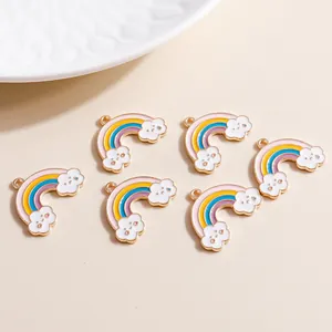 Handmade rainbow cloud smiley charms in colorful enamel with gold metal edges