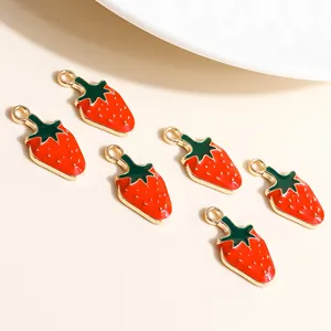 Set of six strawberry alloy charms with red enamel and gold plating for DIY jewelry