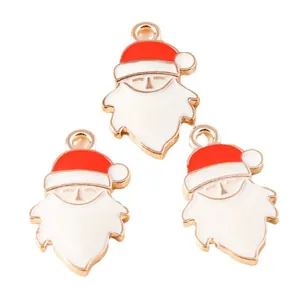 Set of 3 Santa Claus enamel charms in gold-toned alloy for DIY Christmas jewelry making