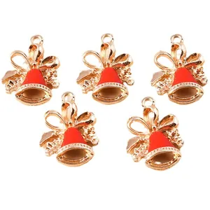 Golden Christmas bell charms with red enamel bow and holly leaves for DIY jewelry making