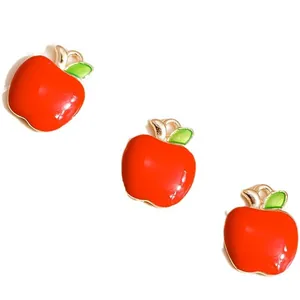 Three red enamel apple pendants with green leaves and gold alloy edges for DIY jewelry