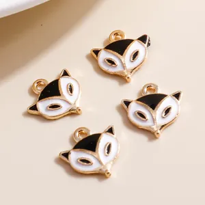 Set of 4 cute enamel fox pendants for DIY jewelry making in gold, black and white