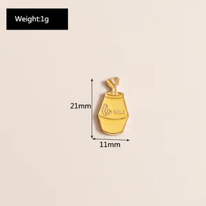Detail showing dimensions of yellow banana milk enamel charm with measurements and weight