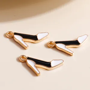 Three elegant black and white enamel high heel charms with gold metal base for DIY jewelry