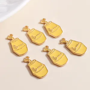 Set of 6 yellow enamel banana milk bottle charms with gold-plated metal loops for DIY crafts