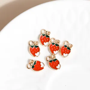DIY strawberry charms in alloy with red enamel and gold finish for jewelry making