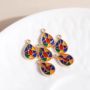 Colorful drop-shaped oil drip pendants with golden metal frames for DIY jewelry making