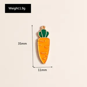 Detail of 35mm carrot enamel pendant with gold finish for DIY jewelry crafts