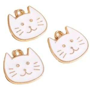Set of three cute cartoon cat head charms in white enamel and gold alloy finish