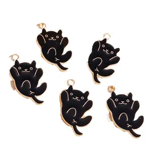 Five black enamel cat pendants with gold plating for DIY jewelry and accessory crafting