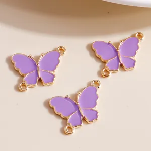 Three purple enamel butterfly pendants with gold plating for DIY jewelry making