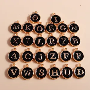 Set of 26 black enamel and gold alloy alphabet letter charms for DIY jewelry making