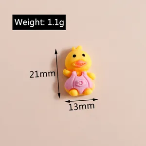 Miniature resin duck charm in pink overalls with precise height and width dimensions