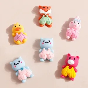 Macro view of assorted resin cartoon animals for DIY phone case decoration