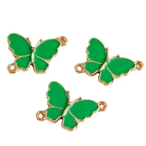 Three green enamel butterfly connectors with gold alloy plating for DIY jewelry making