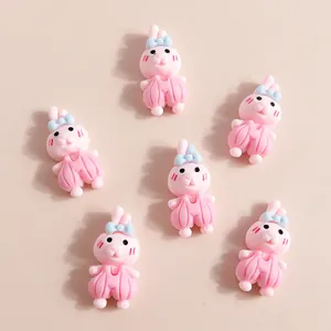 DIY cute pink resin rabbit charms with blue bows and pumpkin pants for phone case crafts