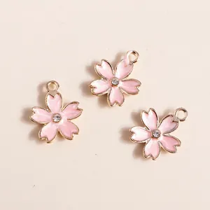 Pink sakura flower enamel pendants with gold plating and crystal center for DIY jewelry