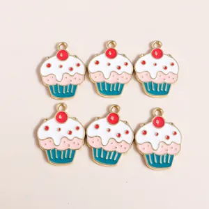 Close-up of six enamel cupcake charms with gold plating and colorful drip oil finish