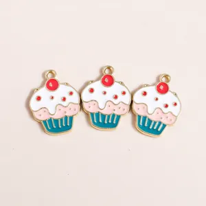 Three enamel cupcake pendants with pink frosting and red cherries for DIY jewelry crafts