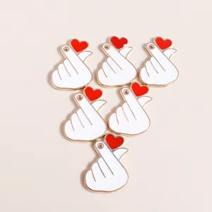 Pack of six heart gesture alloy enamel charms with gold trim for DIY jewelry making