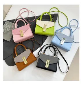 Top-down shot of fashion mini square handbags in five colors with metallic lock