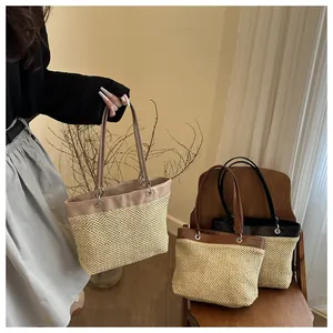 Close-up of woven straw and leather panel details on stylish tote bags in multiple colors