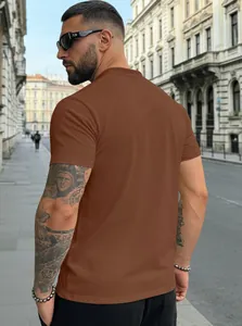 Close-up of premium brown cotton henley t-shirt fabric and seam detail on male model