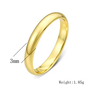 Detail view of 3mm minimalist 14K gold plated silver ring showing size and weight