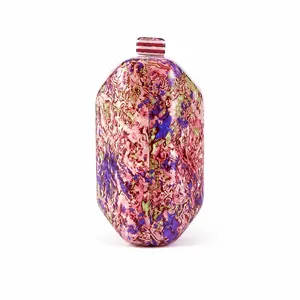 Detailed macro view of acrylic evening clutch with colorful marble art and striped clasp