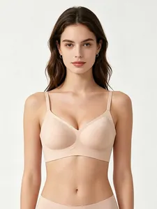 Detail view of seamless jelly bra with soft support and adjustable straps in nude