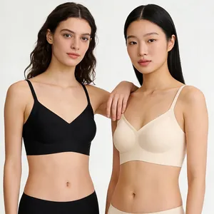 Detail of seamless deep V-neck jelly bra with thin straps in black and beige colors