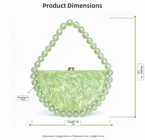 Detail view of pearlescent green acrylic clutch bag with size 26cm x 16cm x 8cm