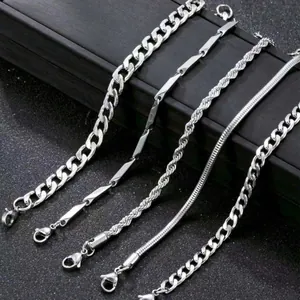 5-piece set of silver metal chain bracelets with flat link and twisted rope designs
