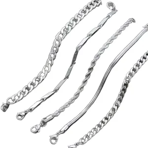 Five-piece vintage silver metal bracelet set featuring Cuban, snake, and rope chain styles
