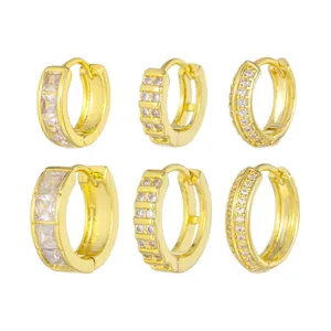 Ensemble de trois paires de créoles dorées ornées de zircones de différents styles