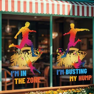 Detail of gradient soccer player silhouettes with inspirational quotes on glass window