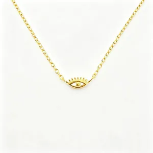 Detail of S925 sterling silver evil eye necklace pendant with a fine gold-plated chain