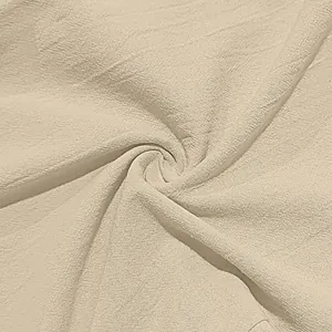 Macro detail of breathable beige cotton linen fabric showing natural woven texture