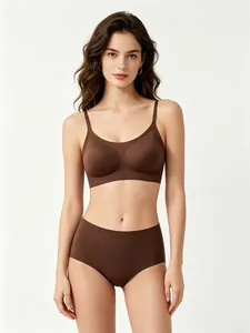 Professional studio shot of brown seamless wireless bra and high-waist panty set on model