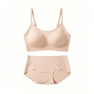 Seamless wireless beige bra and matching high-waist panty set on a white background