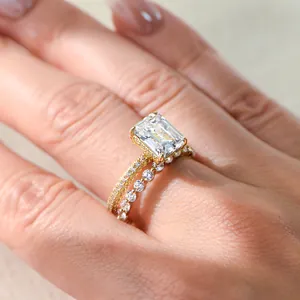 Classic 8x10mm emerald cut zircon ring set with gold finish and pave stones