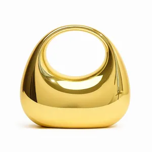Mirror gold acrylic handbag with a modern crescent shape and round cutout handle